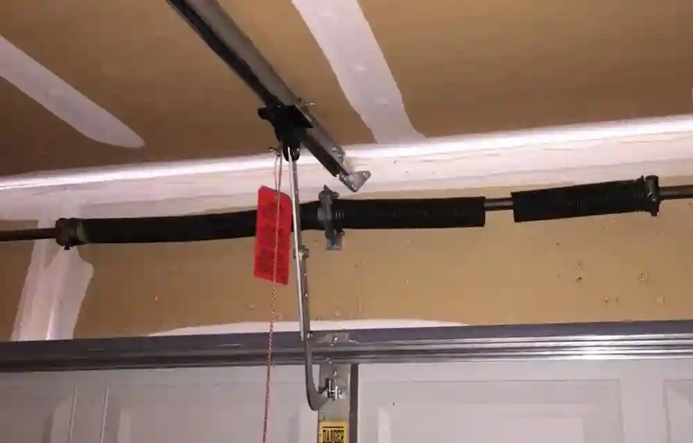 why broken garage door springs should be fixed